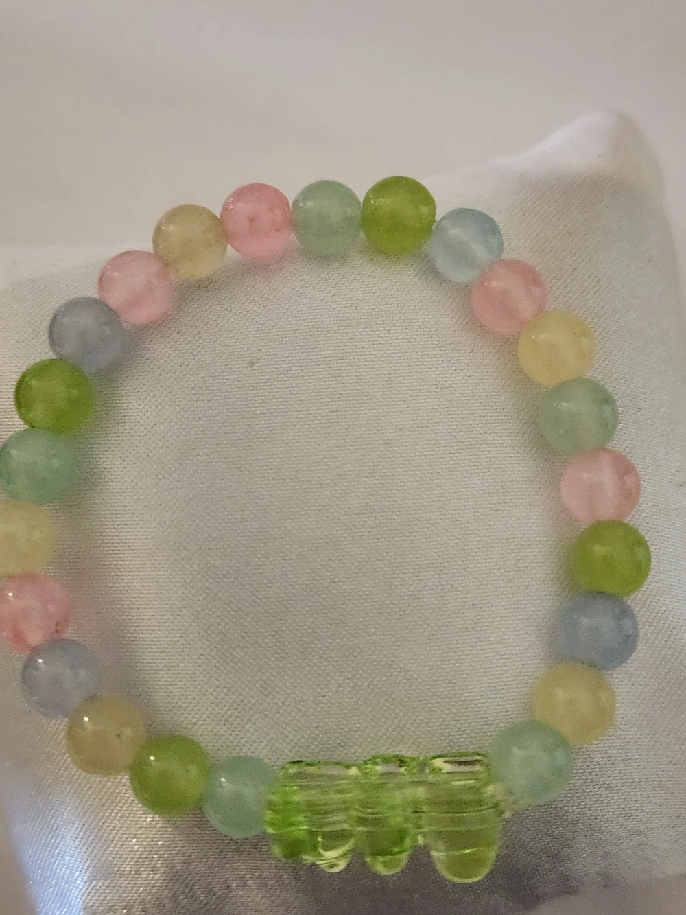Hand Crafted Pastel Beaded Stretch Bracelet with Green Bear Charm